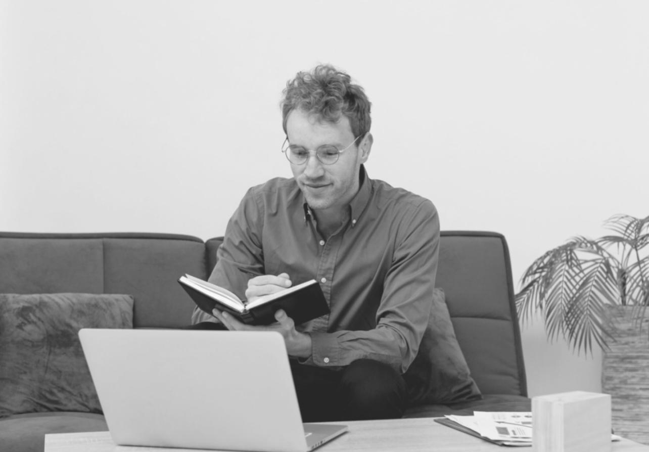Business professional reviewing financial forecasts and budget scenarios