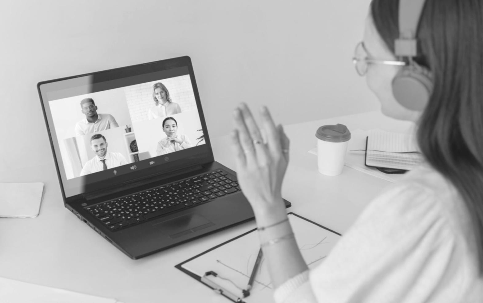 Financial planning workspace with multiple screens and organized documents