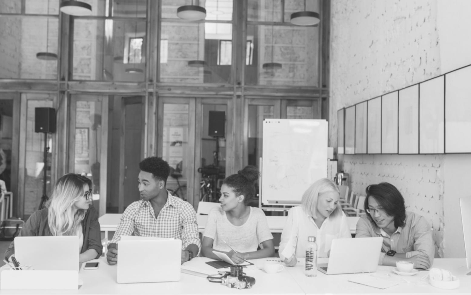 Business team reviewing financial strategies during workshop session